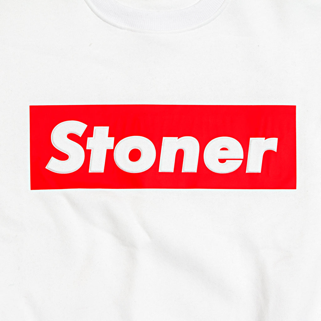 "STONER" in white with red background